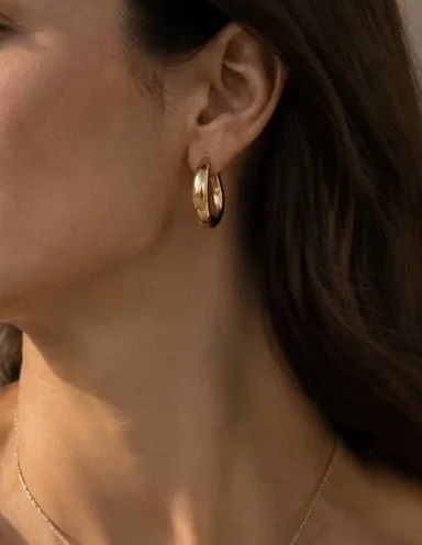 Detail of the Petal Hoop worn close to the ear